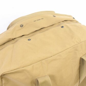 khaki canvas holdall with wrap-around carry straps and &ldquo;broad arrow&rdquo; marking.