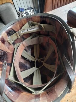 Close-up of the &ldquo;Miller J.H.&rdquo; handwritten name inside the liner webbing