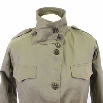 Detail of the button front and pockets on the US Women&rsquo;s M43 jacket