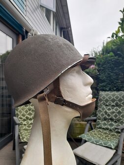Left side view of original McCord M1 swivel bail helmet with Westinghouse Airborne liner
