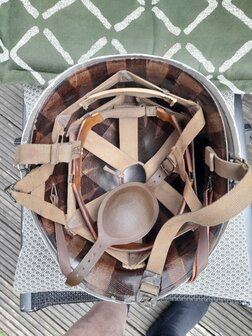 Interior of original M1 helmet with Westinghouse liner, Airborne A-yokes and leather chin cup