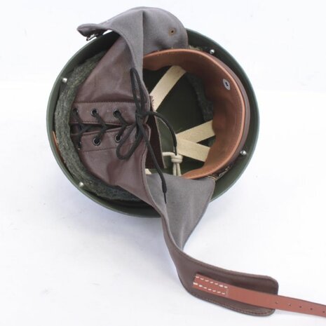 Detail of leather ear protectors and chin strap on WW2 Dispatch Rider helmet