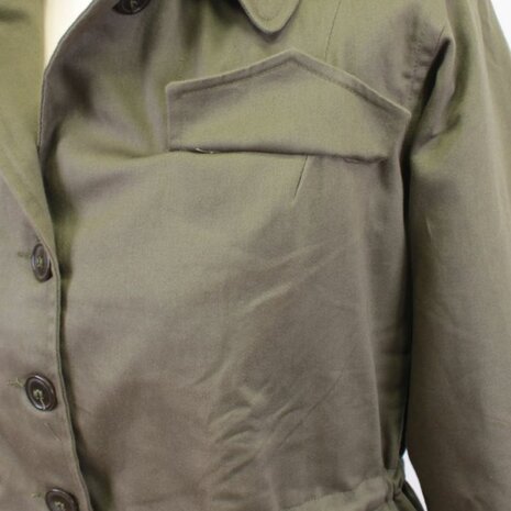 Detail of the button front and pockets on the US Women&rsquo;s M43 jacket