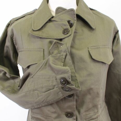 Detail of the button front and pockets on the US Women&rsquo;s M43 jacket