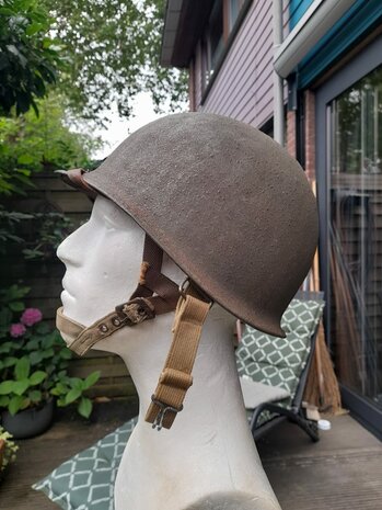 Left side view of original McCord M1 swivel bail helmet with Westinghouse liner