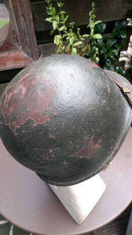 Top view of original M1 Red Bull Division helmet with old paint layers and patina